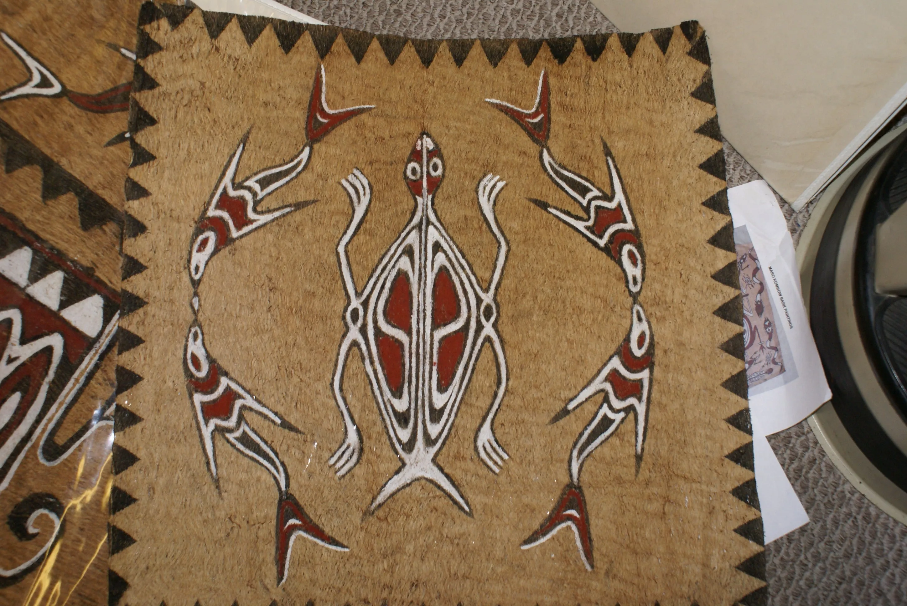 Rare Tapa Bark Cloth (Kapa in Hawaii), from Lake Sentani, Irian Jaya, Papua New Guinea. Hand painted by a Tribal Artist with natural pigments: Spiritual Stylized Motifs of fish and water bugs. 21" x 20,5" (no 38)