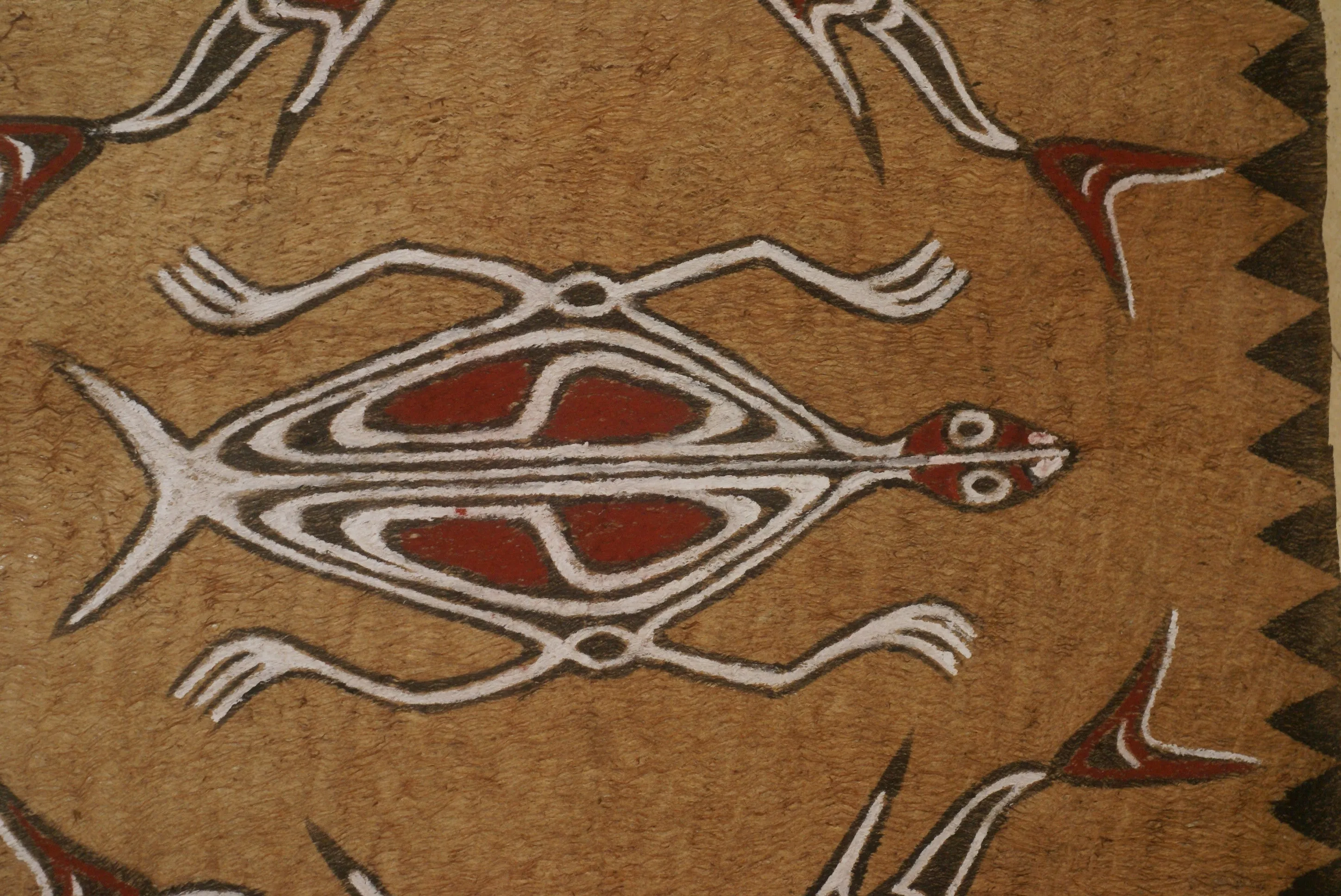 Rare Tapa Bark Cloth (Kapa in Hawaii), from Lake Sentani, Irian Jaya, Papua New Guinea. Hand painted by a Tribal Artist with natural pigments: Spiritual Stylized Motifs of fish and water bugs. 21" x 20,5" (no 38)