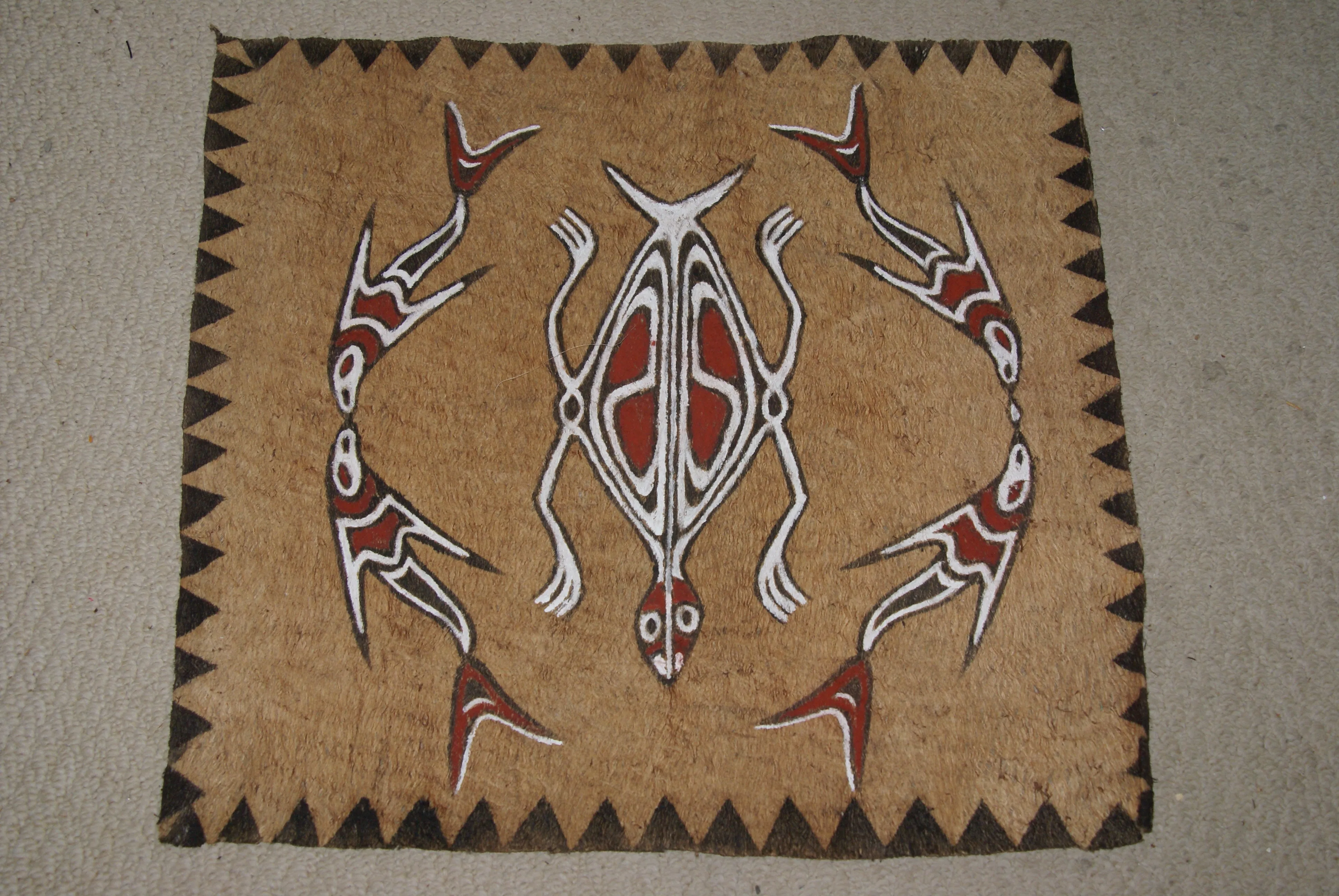 Rare Tapa Bark Cloth (Kapa in Hawaii), from Lake Sentani, Irian Jaya, Papua New Guinea. Hand painted by a Tribal Artist with natural pigments: Spiritual Stylized Motifs of fish and water bugs. 21" x 20,5" (no 38)