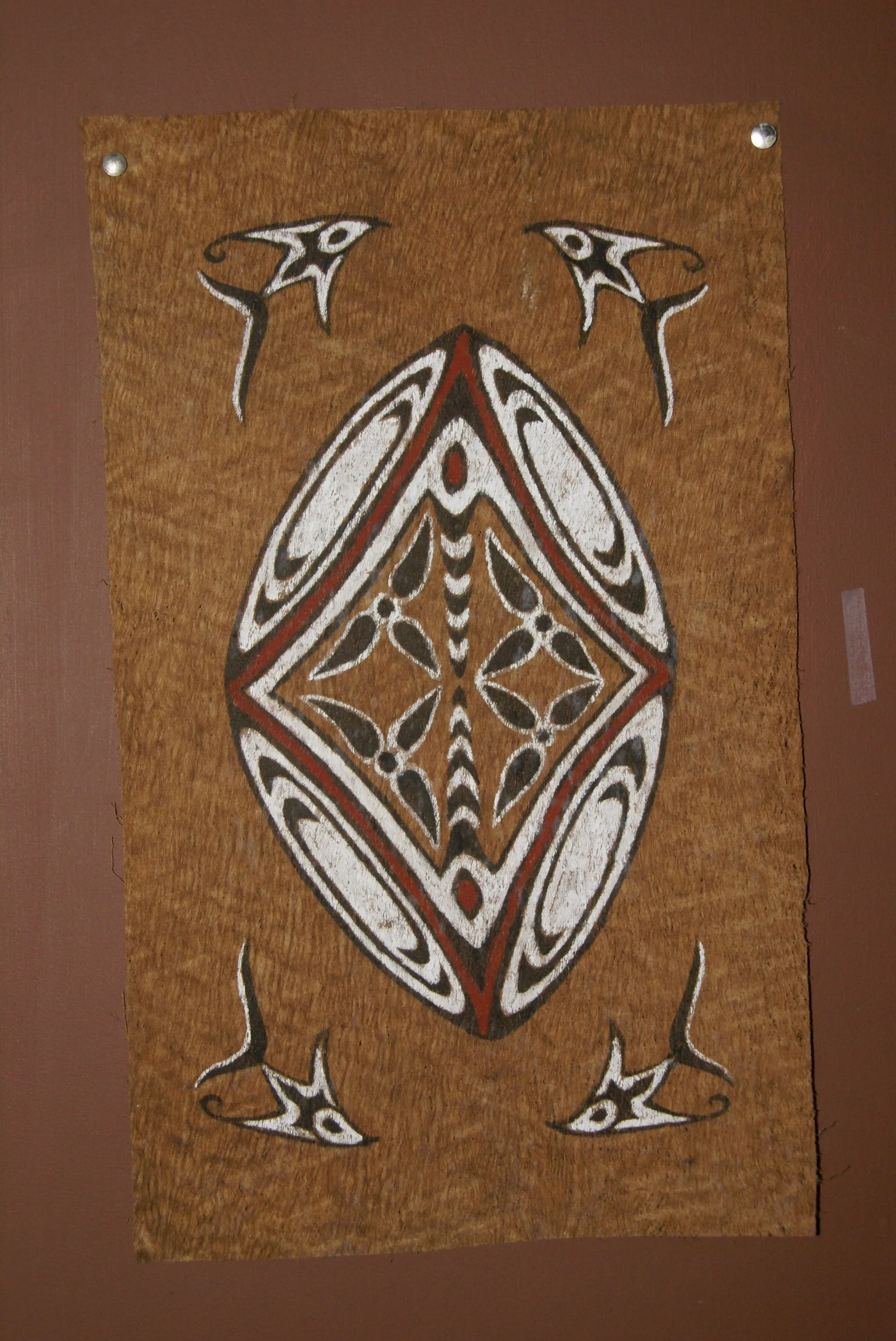 Rare Tapa Bark Cloth (Kapa in Hawaii), from Lake Sentani, Irian Jaya, Papua New Guinea. Hand painted by a Tribal Artist with natural pigments: Spiritual Stylized Shield Motifs 21 1/2" x 13" (no 22)