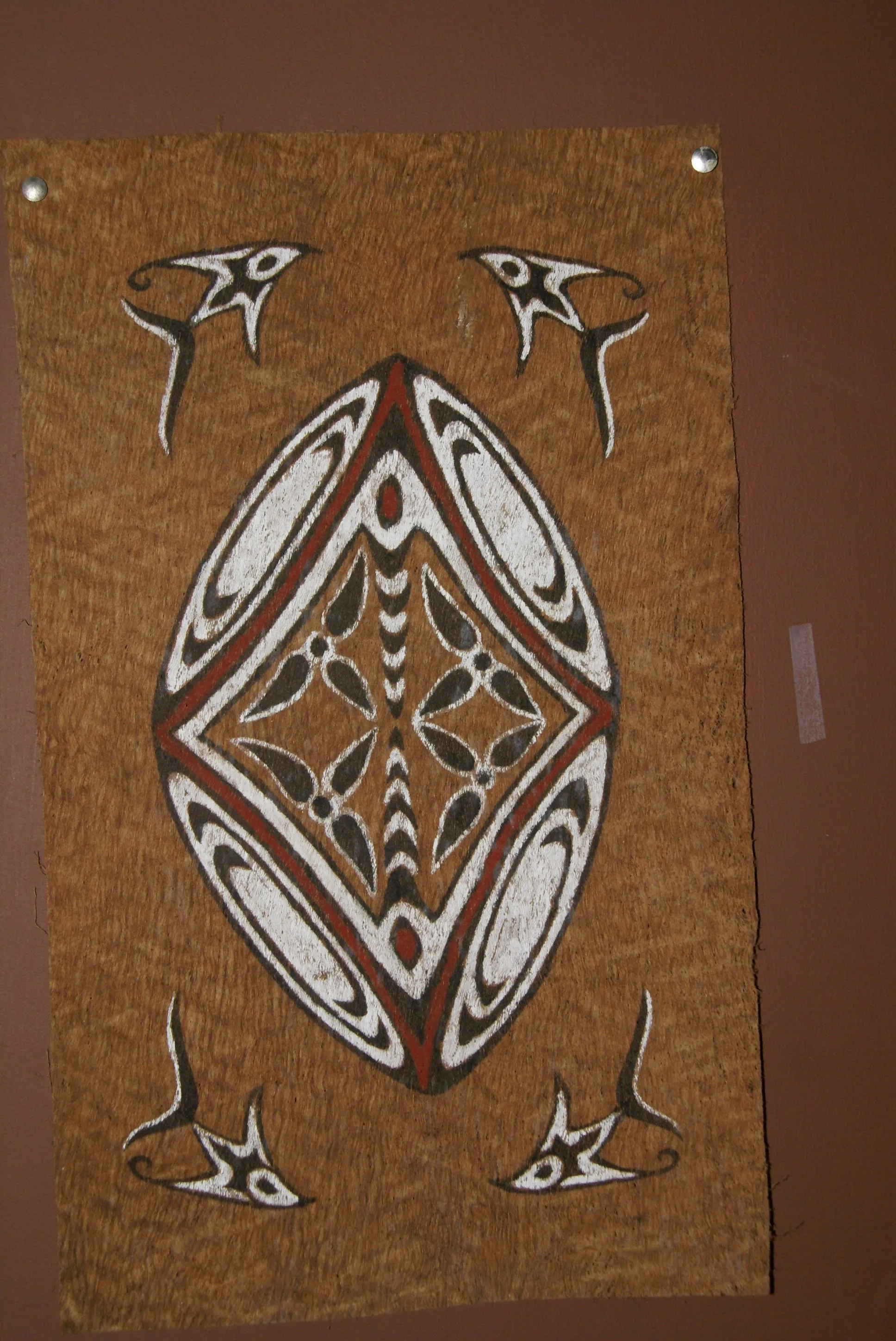 Rare Tapa Bark Cloth (Kapa in Hawaii), from Lake Sentani, Irian Jaya, Papua New Guinea. Hand painted by a Tribal Artist with natural pigments: Spiritual Stylized Shield Motifs 21 1/2" x 13" (no 22)