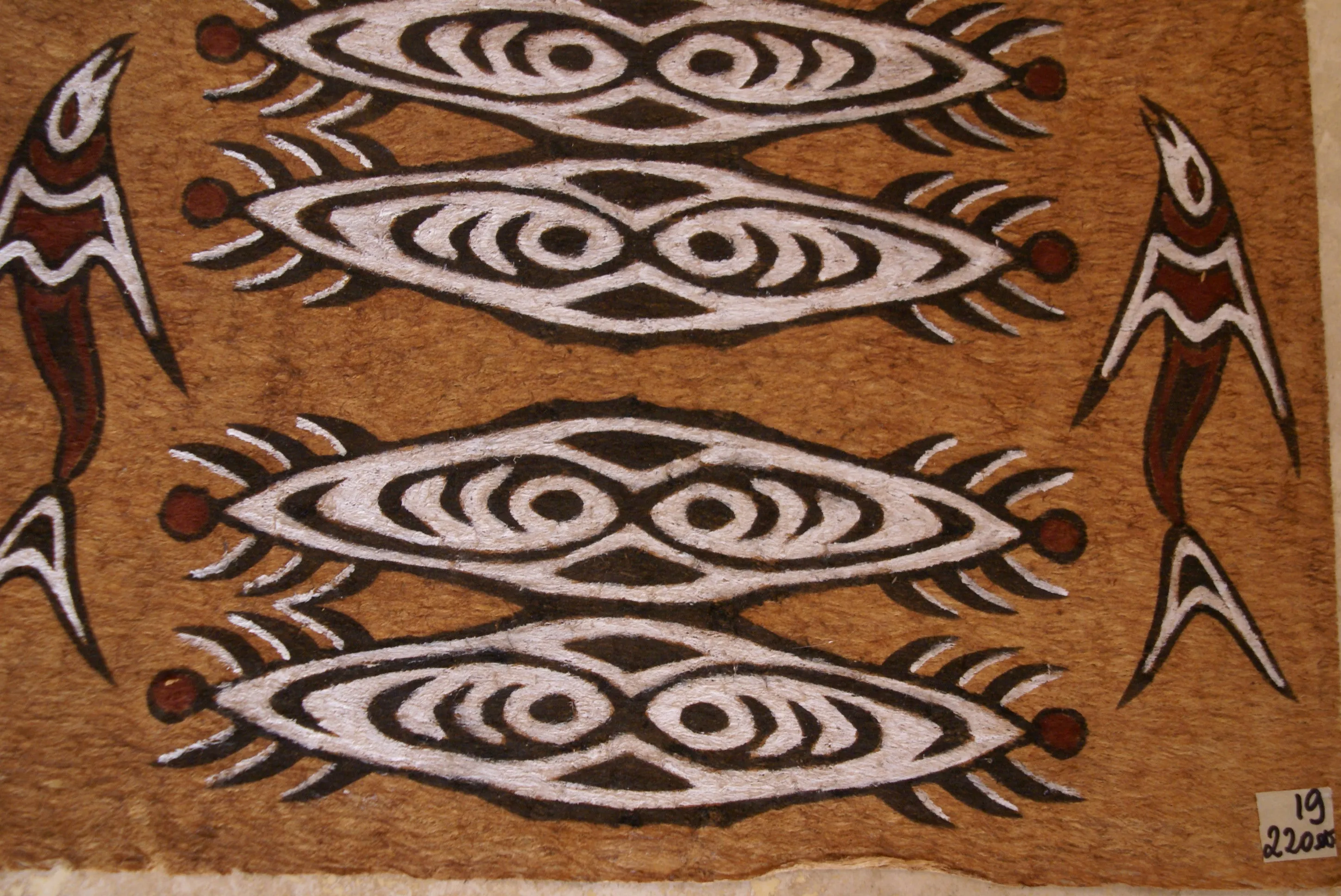 Rare Tapa Bark Cloth (Kapa in Hawaii), from Lake Sentani, Irian Jaya, Papua New Guinea. Hand painted by a Tribal Artist with natural pigments: Spiritual Stylized Shield Motifs & Fish 20" x 13 1/2" (no 23)