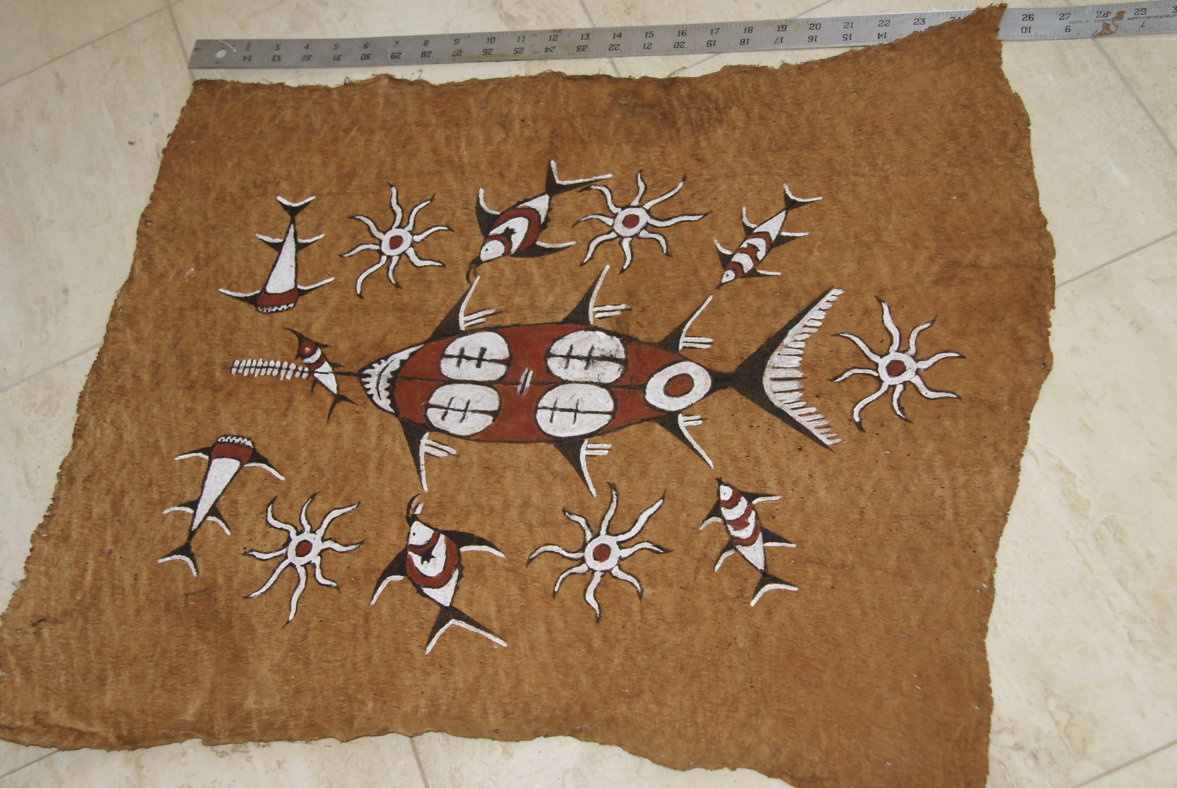 Rare Tapa Bark Cloth (Kapa in Hawaii), from Lake Sentani, Irian Jaya, Papua New Guinea. Hand painted by a Tribal Artist with natural pigments: Spiritual Stylized Sword fish, Fish, Star fish Motifs 26" x 21" (no 12)