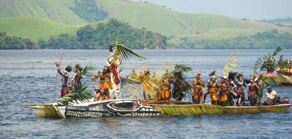 Rare Tapa Bark Cloth (Kapa in Hawaii), from Lake Sentani, Irian Jaya, Papua New Guinea. Hand painted by a Tribal Artist with natural pigments: Spiritual Stylized Sword fish, Fish, Star fish Motifs 26" x 21" (no 12)