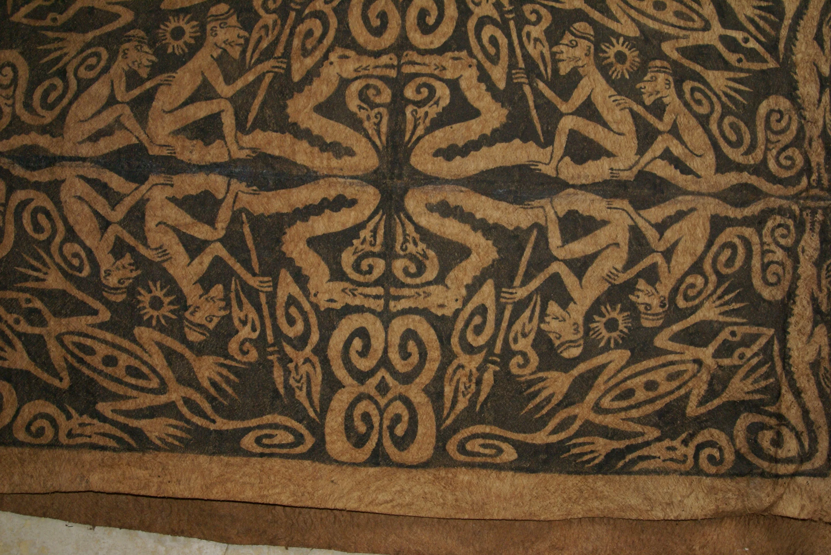 Rare Tapa Bark Cloth (Kapa in Hawaii), from Lake Sentani, Irian Jaya, Papua New Guinea. Hand painted by a Tribal Artist with natural pigments: Spiritual Stylized Warrior Weapons, Snakes, Crocodiles, Gecko Motifs & waves 28" x 18" (no 10)