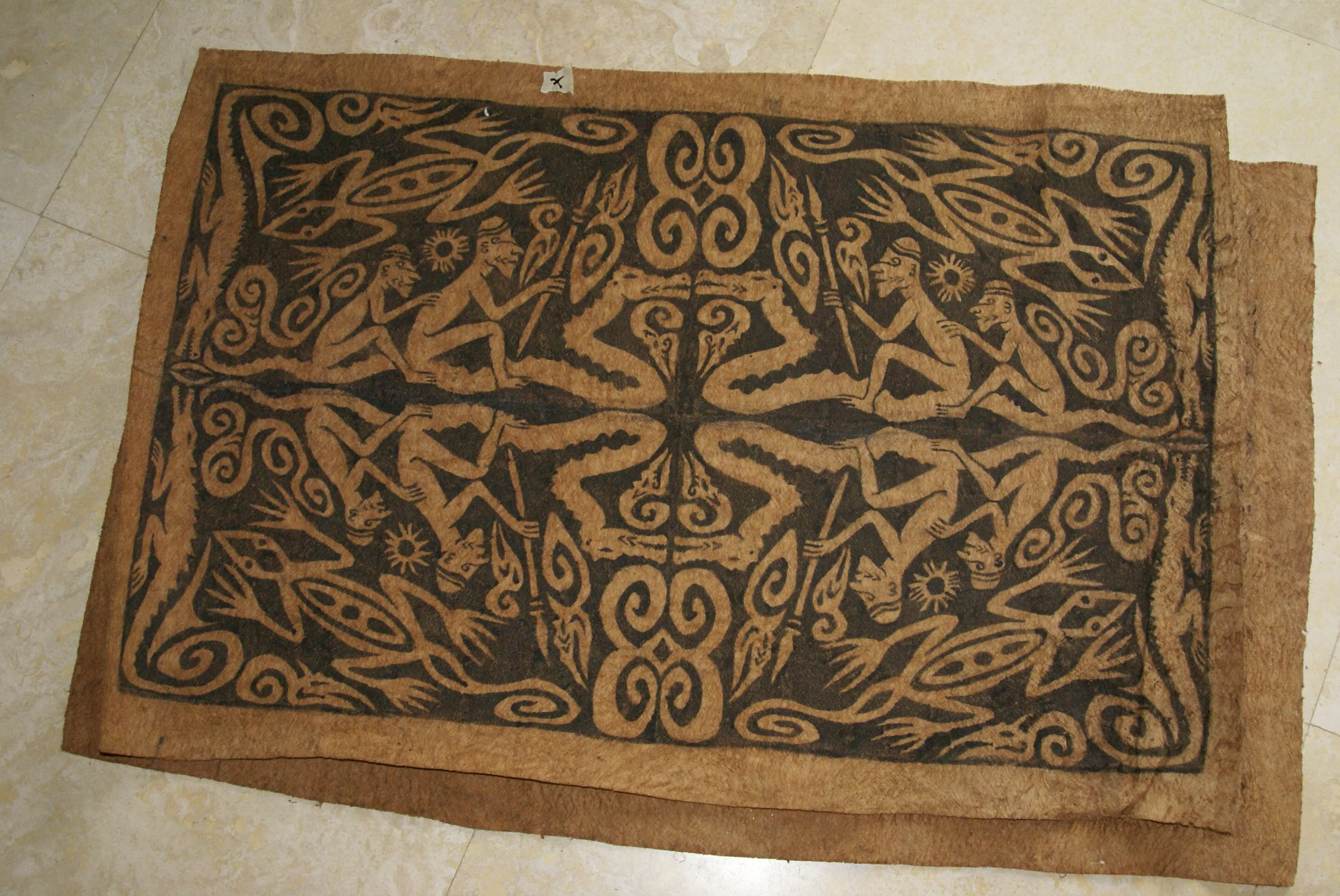 Rare Tapa Bark Cloth (Kapa in Hawaii), from Lake Sentani, Irian Jaya, Papua New Guinea. Hand painted by a Tribal Artist with natural pigments: Spiritual Stylized Warrior Weapons, Snakes, Crocodiles, Gecko Motifs & waves 28" x 18" (no 10)