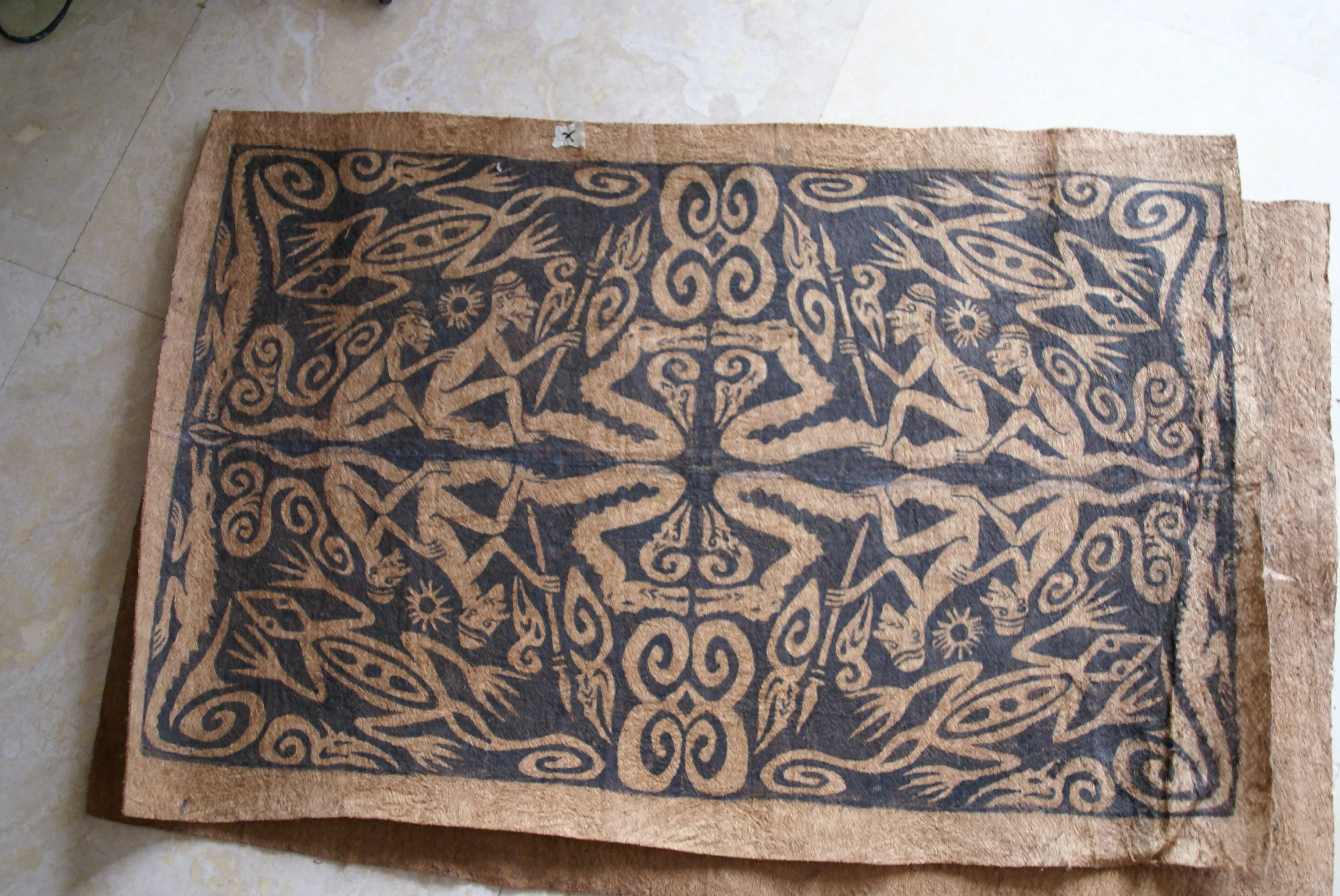 Rare Tapa Bark Cloth (Kapa in Hawaii), from Lake Sentani, Irian Jaya, Papua New Guinea. Hand painted by a Tribal Artist with natural pigments: Spiritual Stylized Warrior Weapons, Snakes, Crocodiles, Gecko Motifs & waves 28" x 18" (no 10)